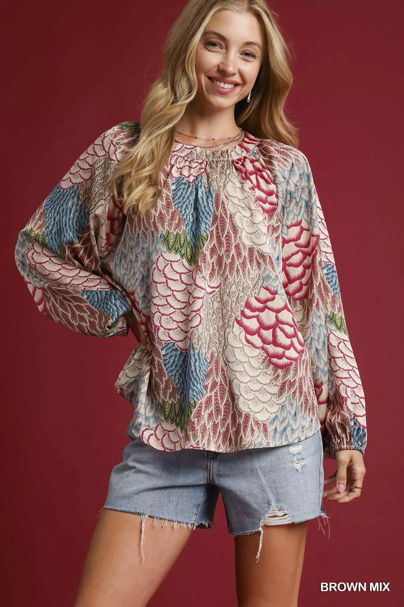 177ce799-30fc-4625-856e-f03695025747-Max-Origin Umgee Boho Feather Print Peasant Blouse - Image 1