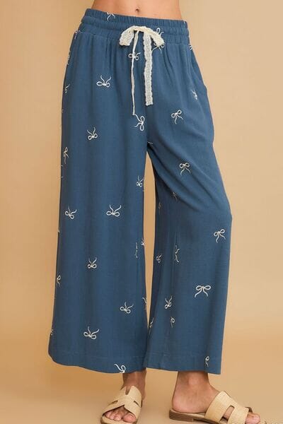 1daa851c-7ec2-424e-8f2d-0dc07a75ae9a-Min Umgee Full Size Lace Drawstring Embroidered Bow Wide Leg Pants Plus Size - Image 1