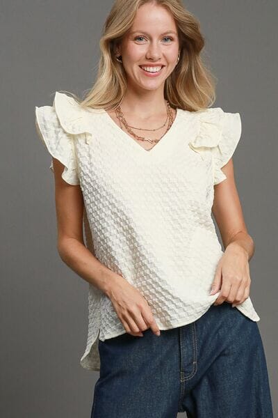 34b4155f-1779-4c28-bc09-5ddcb522bd8f-Min Umgee Full Size Textured Jacquard V-Neck Ruffle Cap Sleeve Blouse Plus Size - Image 1