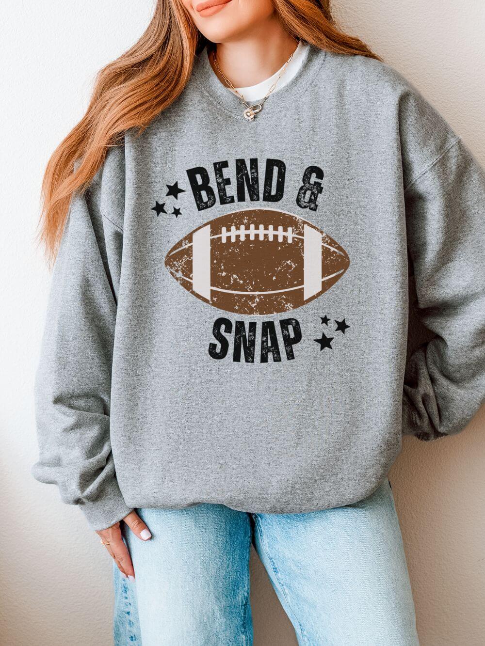 Bend_Snap_Sweatshirt_Sport_Gray Bend & Snap Football Game Day Cozy Crewneck Heavy Blend Graphic Sweatshirt - Image 1