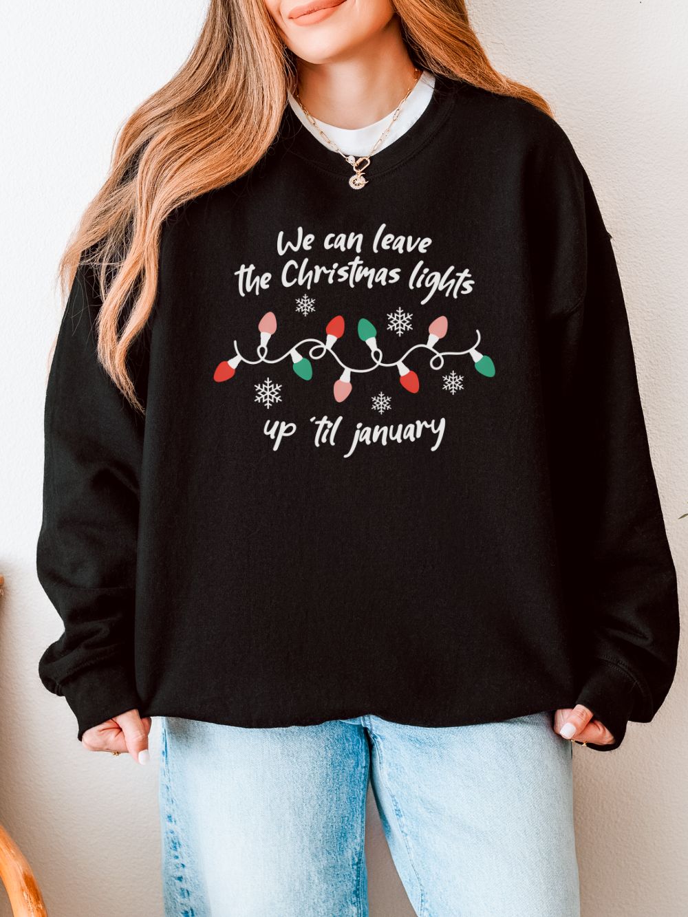 Christmas_Lights_January1_Black Leave the Christmas Lights Up Heavy Blend Women's Crewneck Cozy Sweatshirt - Image 1
