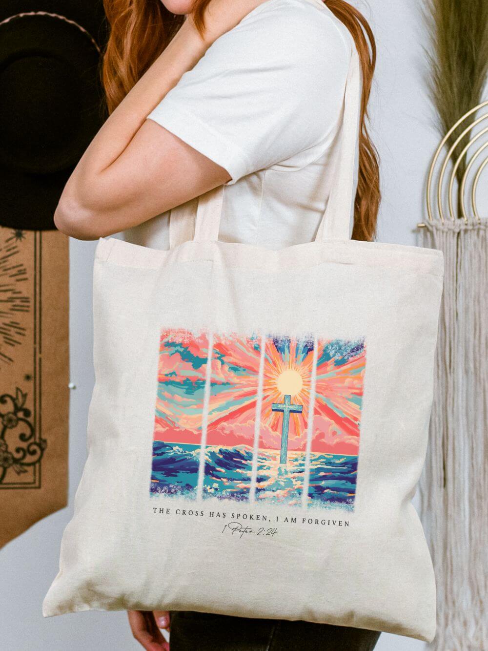 Cross_Has_Spoken_Tote The Cross Has Spoken I am Forgiven Christian Cotton Canvas Tote Bag - Image 1