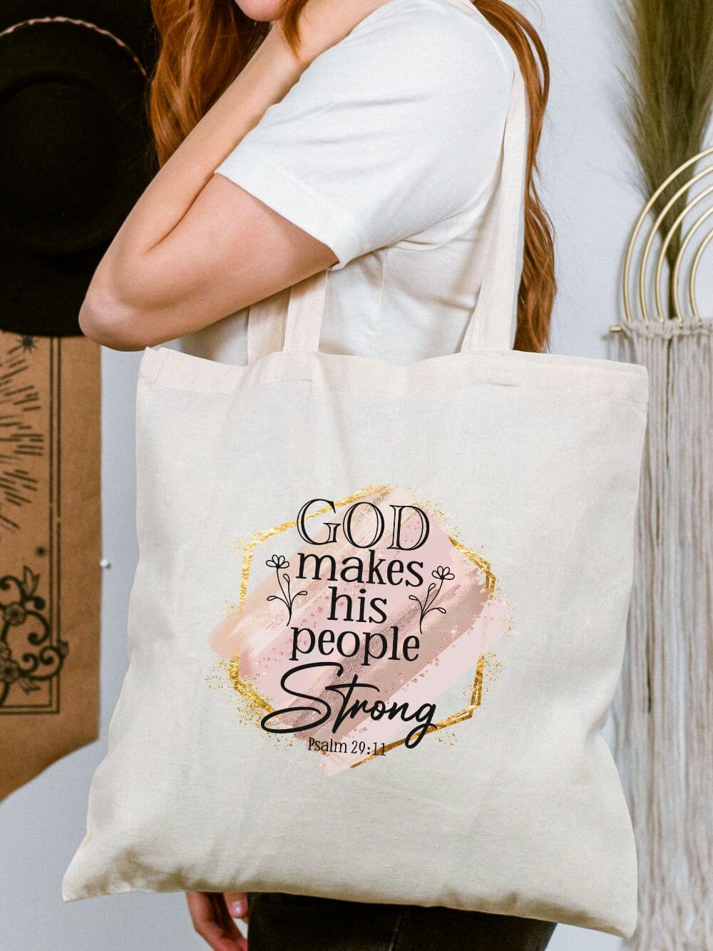 God_Makes_People_Strong_Tote God Makes His People Strong Inspirational Christian Cotton Canvas Tote Bag - Image 1