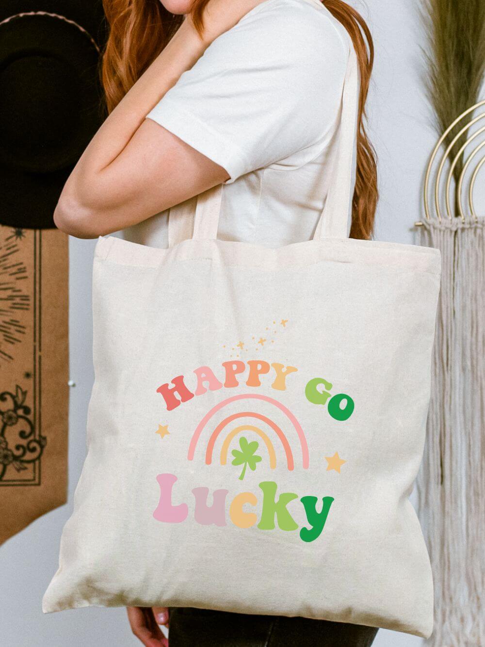 Happy_Go_Lucky_Tote Happy Go Lucky Rainbow Shamrock Cotton Canvas Tote Bag - Image 1