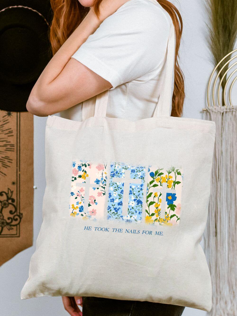He_Took_the_Nails_Tote He Took the Nails for Me Christian Cross Cotton Canvas Floral Tote Bag - Image 1