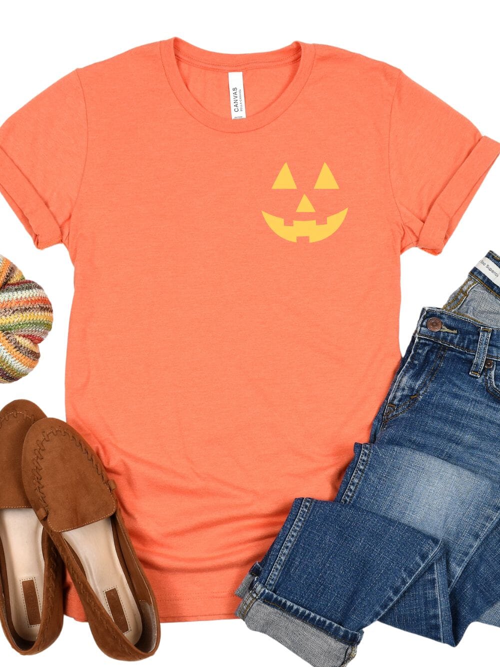 Heather_Orange_2 Glowing Jack-O-Lantern Face Embroidered Unisex T-Shirt - Image 1