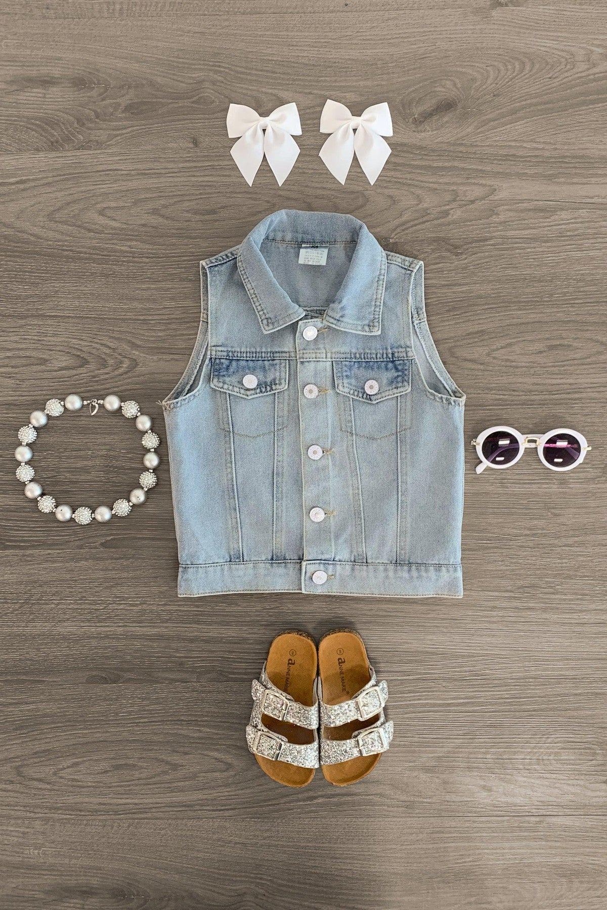 IMG_6604-Edit_9633f877-6af9-4a08-8b5d-1c2c0d2a8a85 Light Blue Denim Vest - Image 1