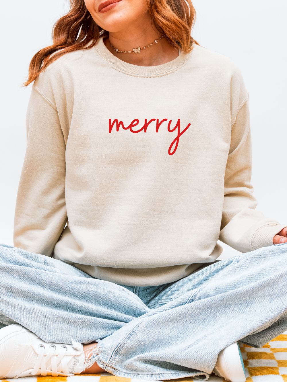 Merry_Red_Script_Sand Merry Red Script Heavy Blend Women's Crewneck Embroidered Christmas Holiday Sweatshirt - Image 1