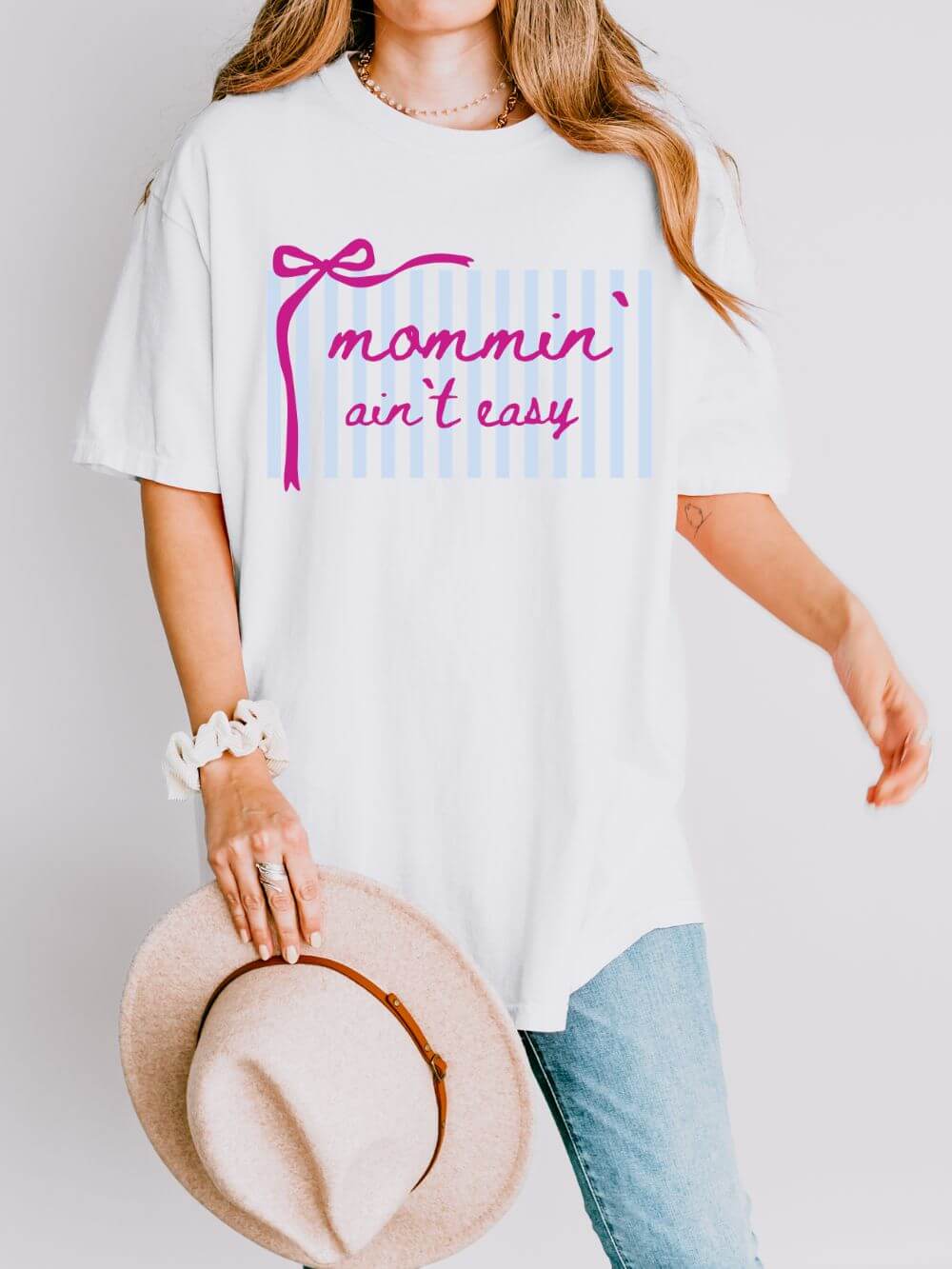 Mommin_Ain_t_Easy_White Mommin' Ain't Easy Graphic T-Shirt Cute Striped Mom Life Tee - Image 1