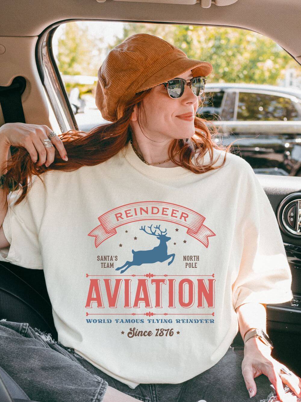 Reindeer_Aviation_Ivory Reindeer Aviation Holiday Tee Vintage Charm Unisex Christmas T-Shirt - Image 1