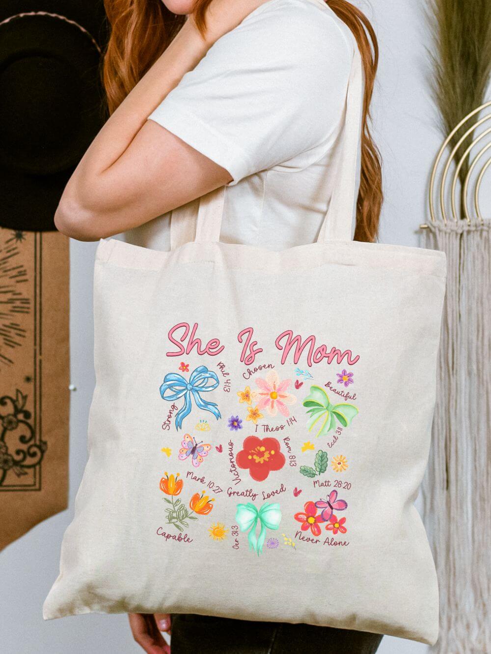She_is_Mom_Tote She Is Mom Floral Christian Women's Cotton Canvas Tote Bag - Image 1