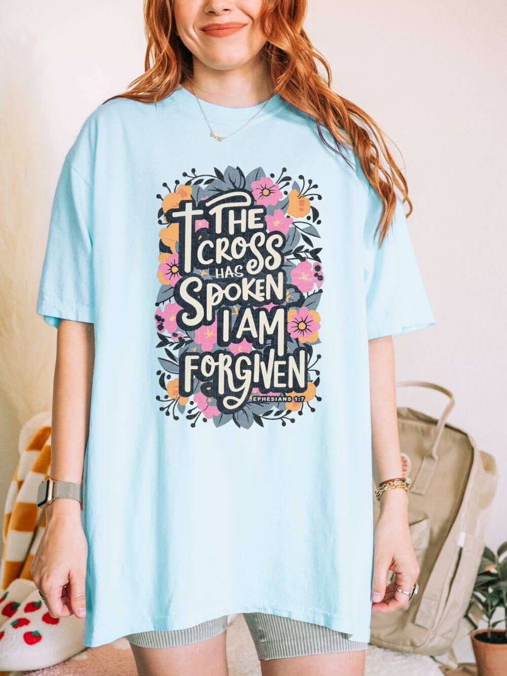 The_Cross_has_Spoken_Chambray The Cross Has Spoken I Am Forgiven Christian T-Shirt Unisex Floral Faith Distressed Tee - Image 1